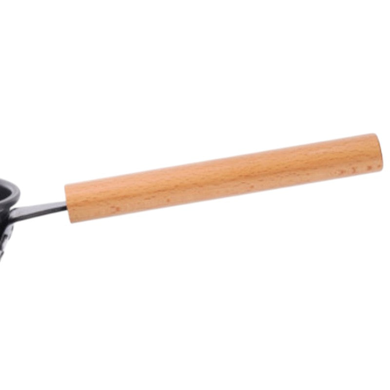 Nærbillede af et langt skaft i lyst træ