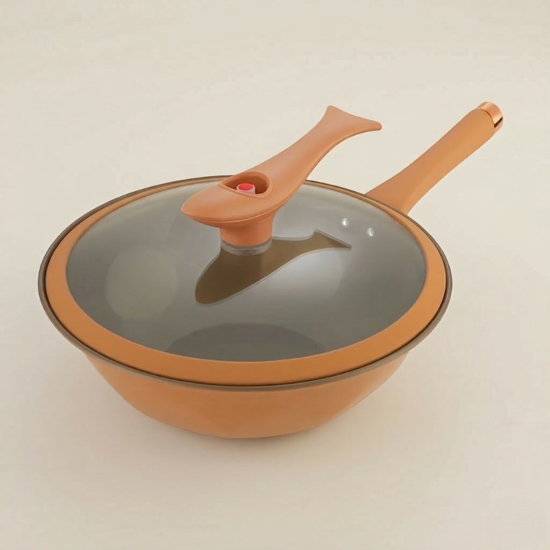 Le Ibuki stor wokgryde i orange med låg af glas, fiskeformet knop og langt skaft på lys baggrund