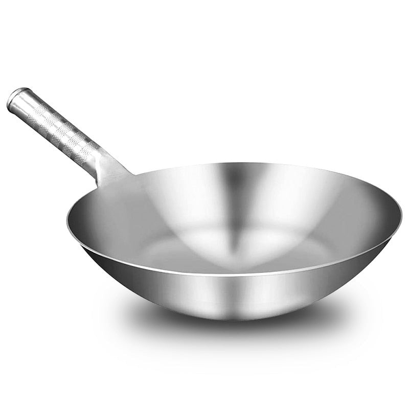 Le Soyak wok i rustfrit stål med rund bund og langt riflet håndtag, set fra siden på hvid baggrund
