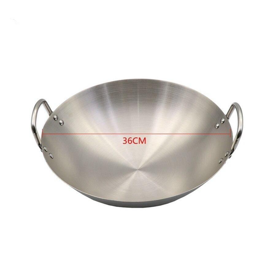 Wokken set forfra med en målestreg, der viser diameteren på 36 cm